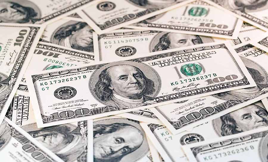 Dólar fecha a R$ 5,21 e acumula queda de mais de 3% na semana