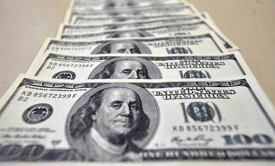 Dólar encosta em R$ 5,20 com inflação nos EUA