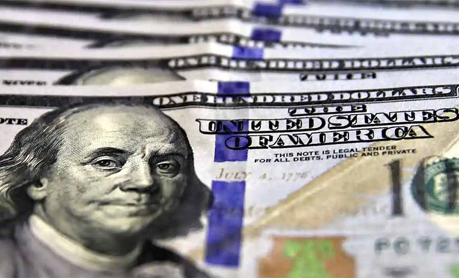 Dólar cai para R$ 5,11 com alívio externo e decisão da agência Moody’s